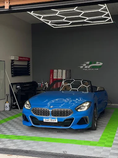 BMW Z4 azul após aplicação de película na loja HB Películas